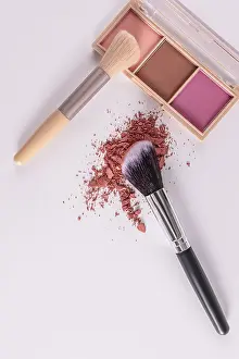 Beauty Cosmetics Impressions: An open pack of multi-colored blush