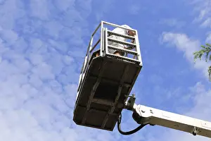 Construction Equipment Operator Impressions: Painter on a working platform