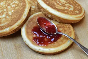 Raspberry Jam Impressions: Pancake with raspberry jam and spoon