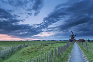 Cloudy Morning Light Impressions: Path to windmill in clouded dusk