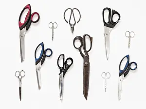 White Background Collage Impressions: Pattern from various scissors on white background