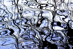 Reflective Water Surfaces Impressions: Patterns reflected on a water surface