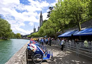 French Religious Landmarks Impressions: Pilgrims in front of the Baths