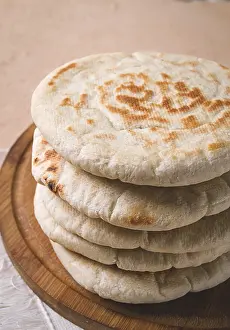 Pita Bread Stack Impressions: Pita bread, stack, on the table, no people