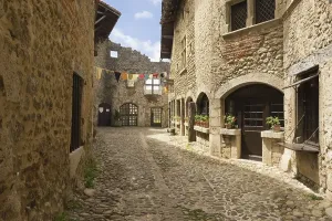 Uninhabited Stone Houses Impressions: Cobblestone street, medieval walled town of Perouges