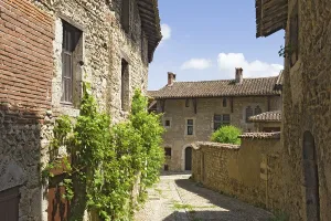 Uninhabited Medieval Fortress Impressions: Cobblestone street, medieval walled town of Perouges