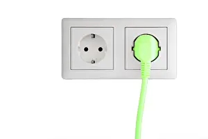 Ecological Conservation Image Impressions: Power socket with a green plug