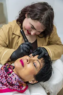 Permanent Makeup Impressions: Professional technician using a microblading tool