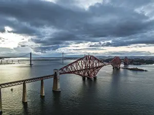 Forth Bridge Scotland Impressions: Rain clouds over Forth Bridge from a drone