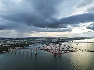 Forth Bridge Scotland Impressions: Rain clouds over Forth Bridge from a drone