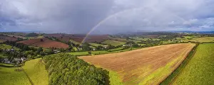 Drone Photography Devon England Impressions: Rainbow over the Fields over Compton Castle from a drone