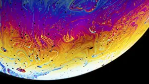 Deserted Interior Space Photo Impressions: Rainbow soap bubble on a dark background