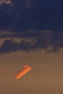 Southern Germany Skyline Impressions: Reddish small cloud in evening light