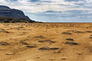 Icelandic Mountain Scenery Impressions: Remote sandy beach, wind-created structures