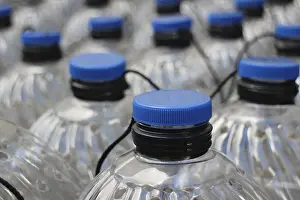 Plastic Bottles Impressions: Rows translucent plastic bottles close to