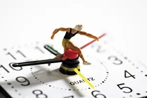 Clock Face Close Up Impressions: Runner on a clock: time is running out