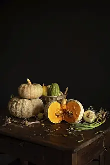 Wooden Table Photography Impressions: A rustic still life featuring pumpkins