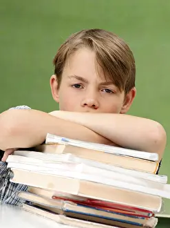 Schoolboy With Books Impressions: Schoolboy with a stack of books