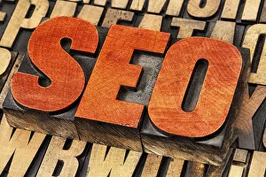 Vintage Letterpress Typography Impressions: SEO (search engine optimization) acronym - word abstract in vintage letterpress wood type stained by red ink