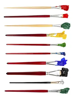 Colourful Art Supplies Impressions: Set of flat brushes with different colored tips in blobs