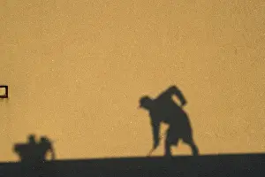 Human Being At Work Impressions: Shadow of a construction worker