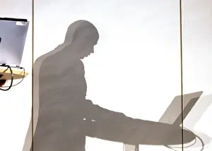 Businessman With Laptop Impressions: Shadow of manager with laptop