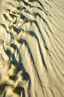 Daytime Desert Scene Impressions: Shadow patterns in the sand