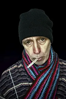 Dark Background Images Impressions: Sick man with the flu and temperature