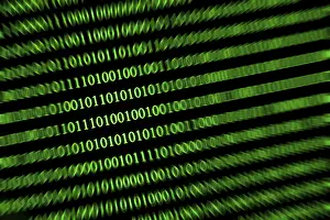 Dark Background Design Impressions: Slanted green binary code on a black background