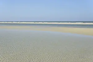 North Sea Beach Impressions: Small waves with light reflections