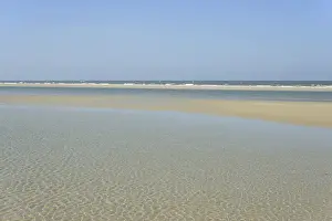 Juist Island Beach Impressions: Small waves with light reflections
