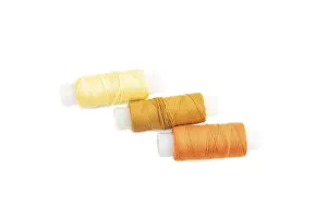 Flat Lay Concept Image Impressions: Spool of thread isolated on white background