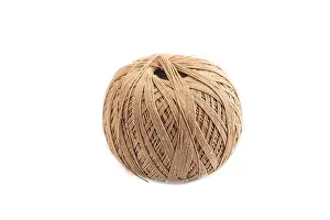 Embroidery Equipment Impressions: Spool of thread isolated on white background