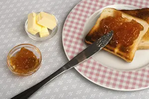 Homemade Breakfast Ideas Impressions: Spread jam on bread with knife