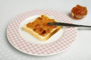 Homemade Breakfast Ideas Impressions: Spread jam on bread with knife