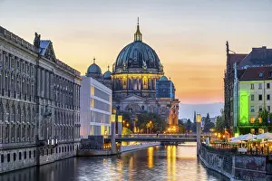 Central Europe Historic Quarter Scene Impressions: The Spree in Berlin after sunset with the cathedral in the background
