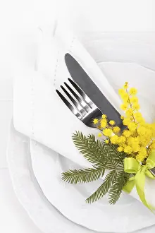 Gastronomy Celebration Impressions: Spring table setting with mimosa easter holidays dinner