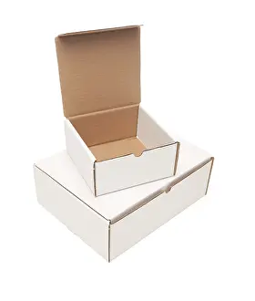 White Studio Backdrop Impressions: Stack of blank white cardboard boxes