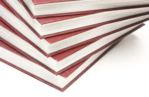 Deserted Book Pile Impressions: Stack of books isolated on a white background