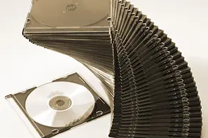 Data Storage Devices Impressions: Stack of CDs