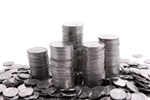White Background Currency Impressions: Stack of coins isolated on a white background