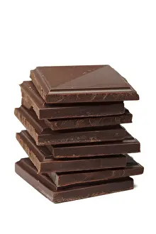Dark Chocolate Impressions: Stack of dark chocolate isolated on white
