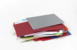 Colorful Stationery Impressions: Stack of different coloured envelopes