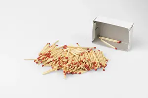 Bright White Background Impressions: Stack of matches in front of almost empty box