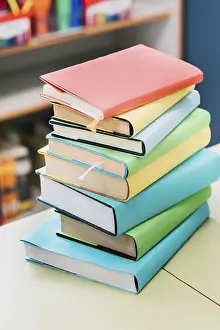 Educational Institution Background Impressions: Stack multicolored books table