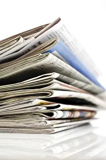 Studio Shot Of Papers Impressions: Stack of newspapers