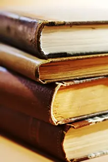 Deserted Library Impressions: Stack of old books