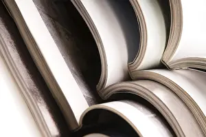 Waste Management Practices Impressions: Stack of open magazines