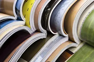 Deserted Library Impressions: Stack of open magazines