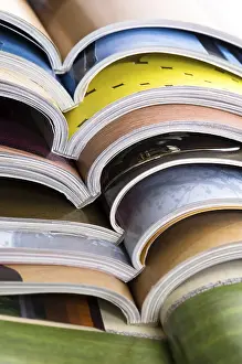 Waste Management Practices Impressions: Stack of open magazines